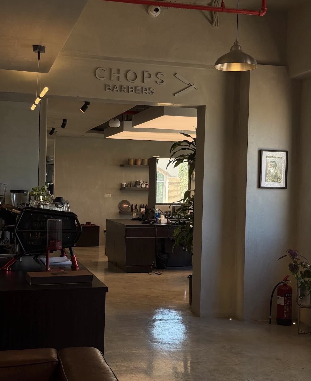 Chops Barbers interior sign above the coffee bar